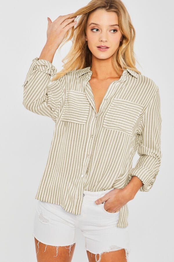 Blusa de rayas con bolsillos frontales - Image 26