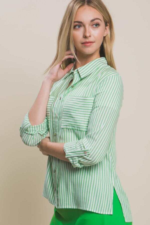 Blusa de rayas con bolsillos frontales - Image 31
