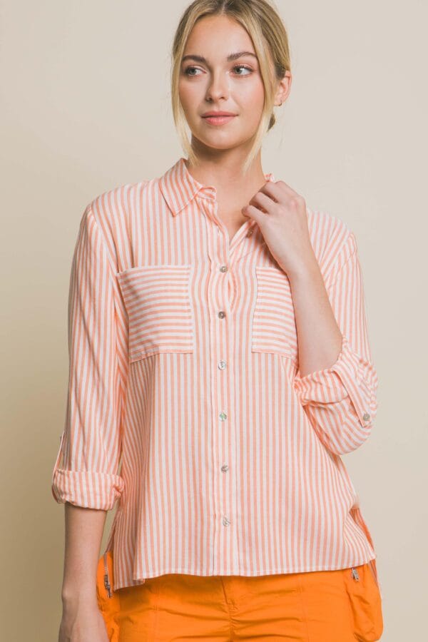 Blusa de rayas con bolsillos frontales - Image 13