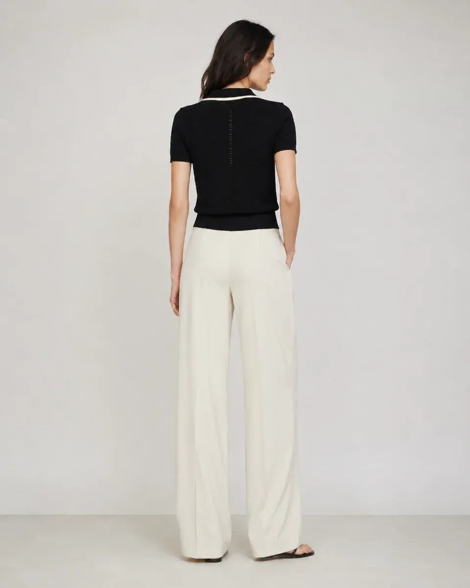 Blusa Polo Tejida Negra Con Botones Dorados Para Mujer - Image 7